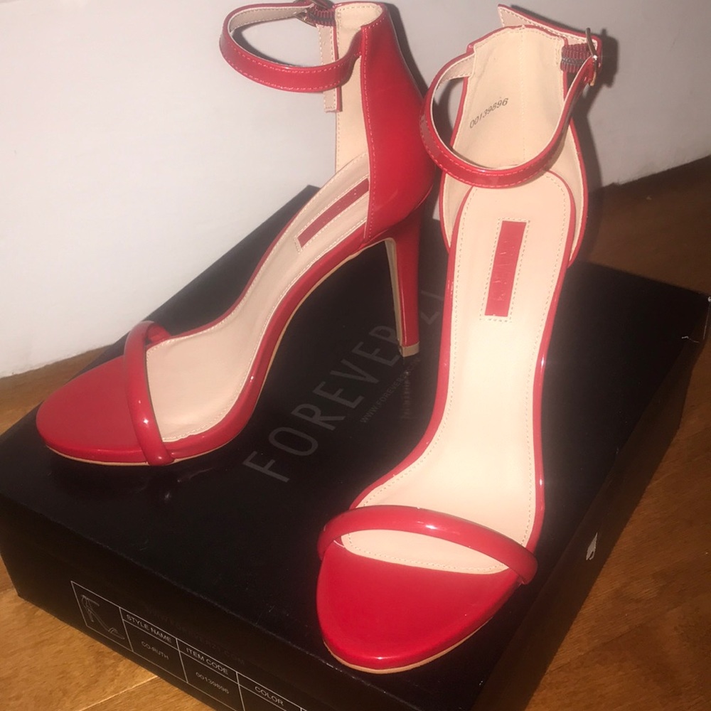 Red faux leather heels